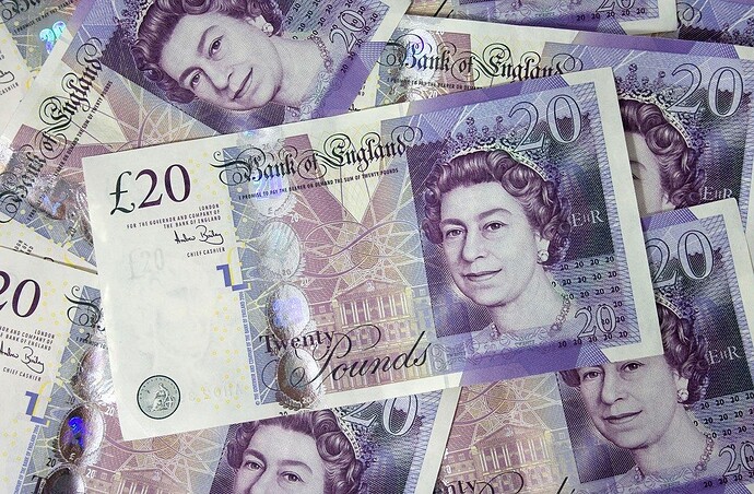 A stack of UK twenty pound notes