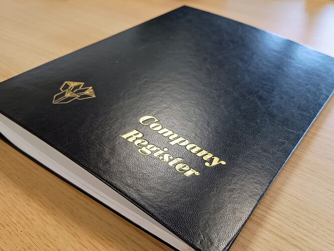 Black folder with the words 'Company Register' debossed in the one corner and an icon in the other